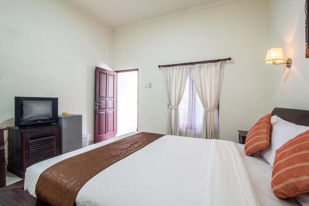 Puri Yuma Hotel Денпасар Екстериор снимка