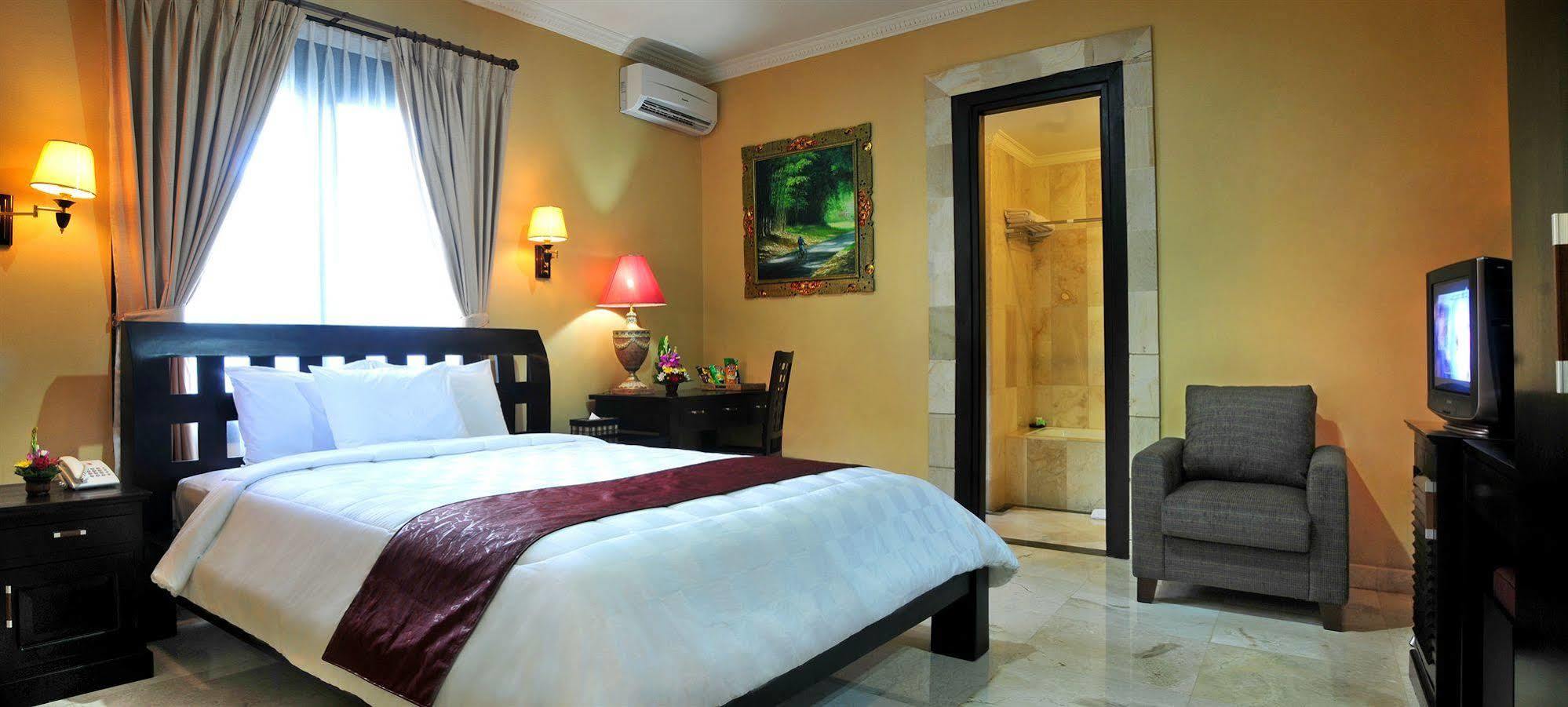 Puri Yuma Hotel Денпасар Екстериор снимка