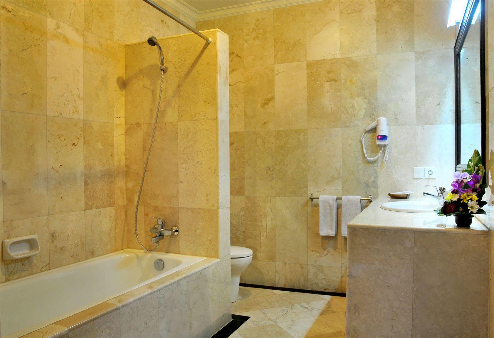 Puri Yuma Hotel Денпасар Екстериор снимка